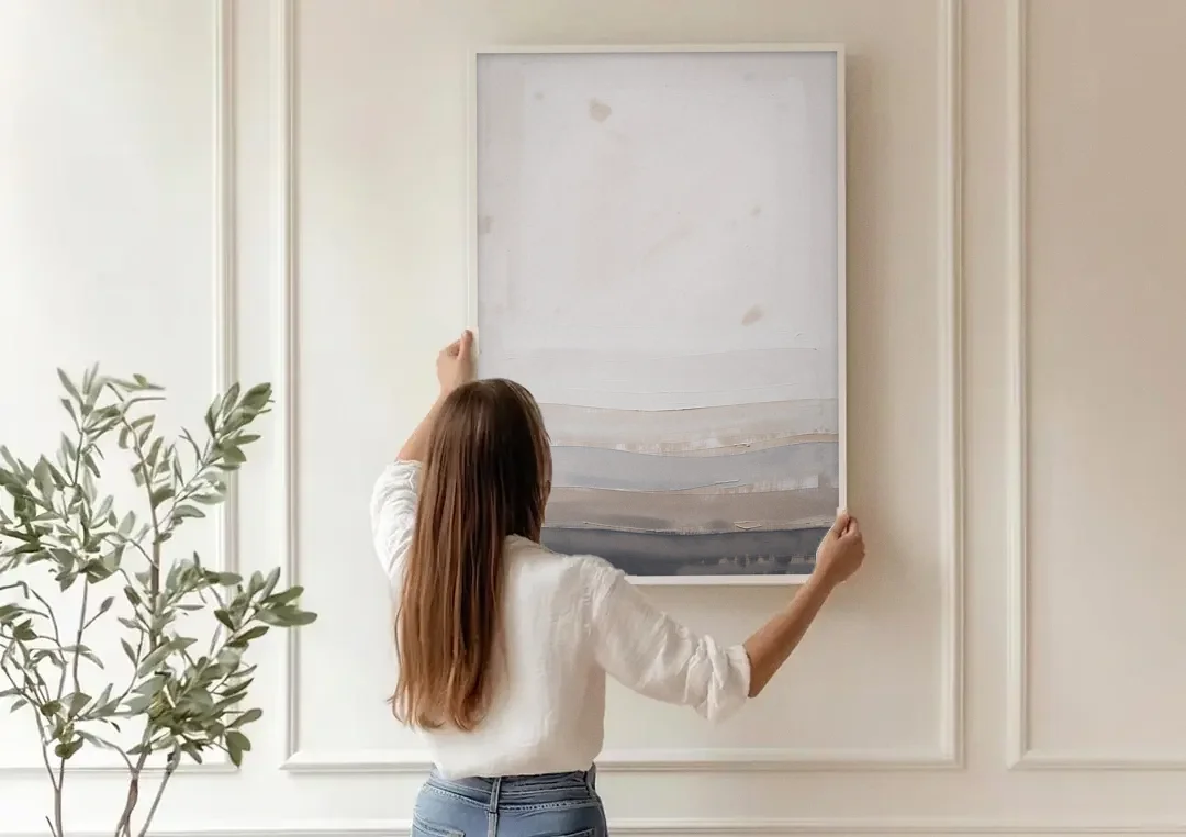 Muted Abstract Wall Art of Rising Morning Haze canvas wall art being hung on a paneled wall