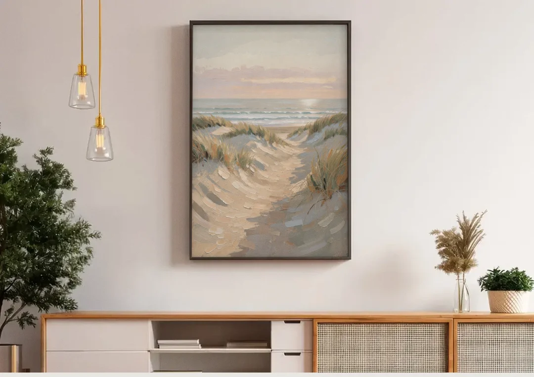 Muted Landscape Painting of a Dune Path canvas wall art above a wooden sideboard under pendant lights