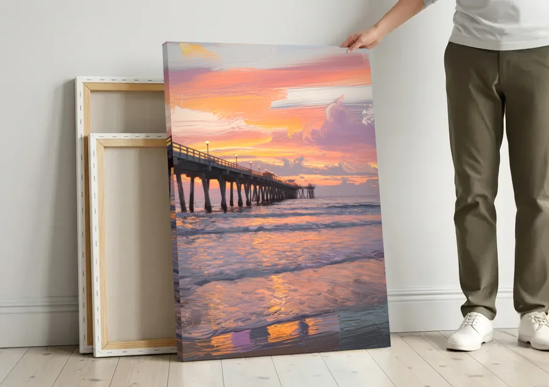 Myrtle Beach Pier at Sunset canvas wall art leaning against a wall next to blank canvases