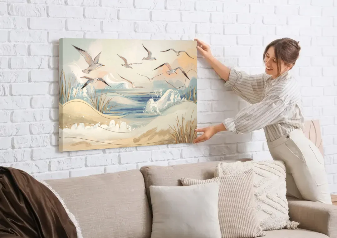 Myrtle Beach Seagulls In Flight canvas wall art being hung on a white brick wall above a sofa