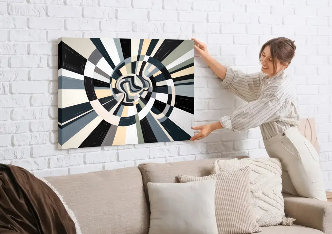 Mystic Geometric Black and White Abstract canvas wall art being hung on a white brick wall above a sofa