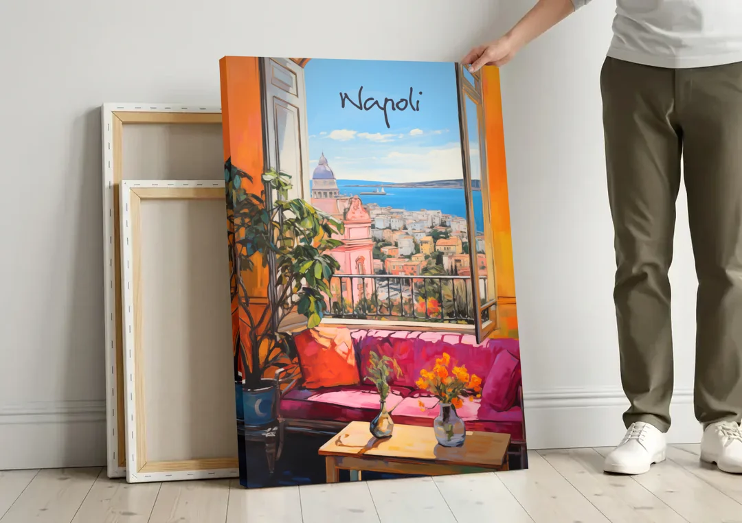 Naples Art of a Room Over the Bay canvas wall art leaning against a wall next to blank canvases