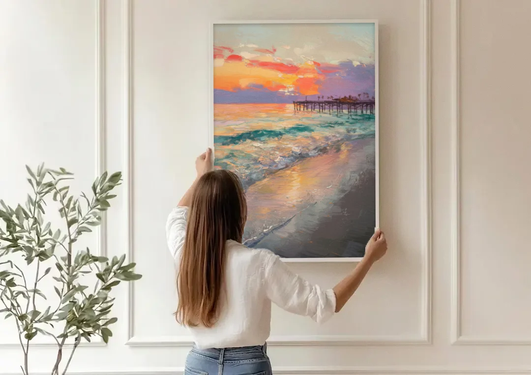 Naples Beach Sunset canvas wall art being hung on a paneled wall