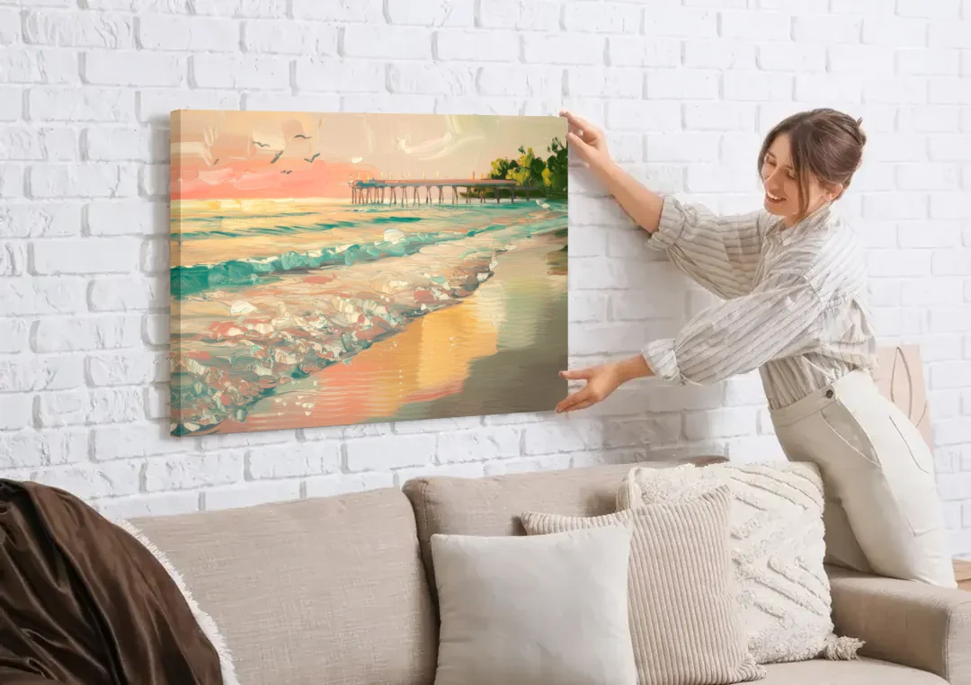 Naples Gulf Shore Serenity canvas wall art being hung on a white brick wall above a sofa