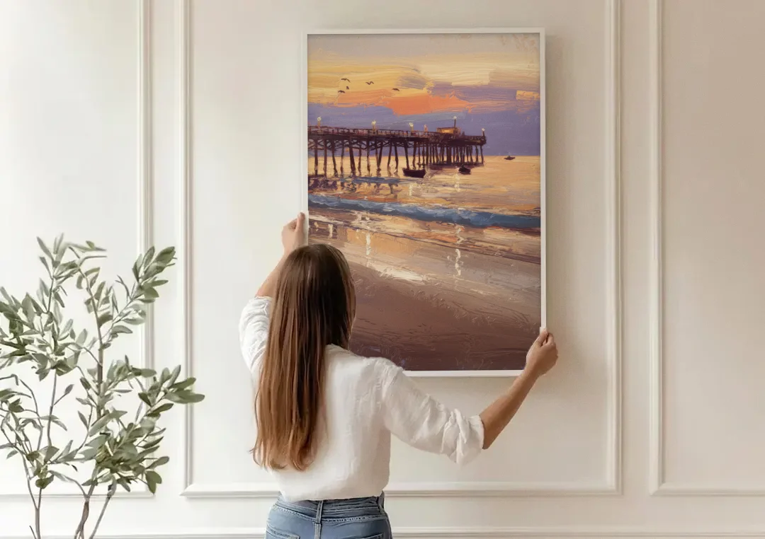 Naples Pier at Twilight canvas wall art being hung on a paneled wall
