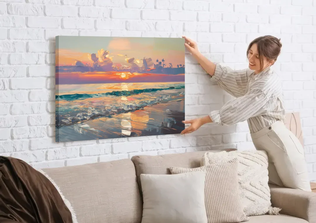 Naples Sunset Over The Gulf canvas wall art being hung on a white brick wall above a sofa