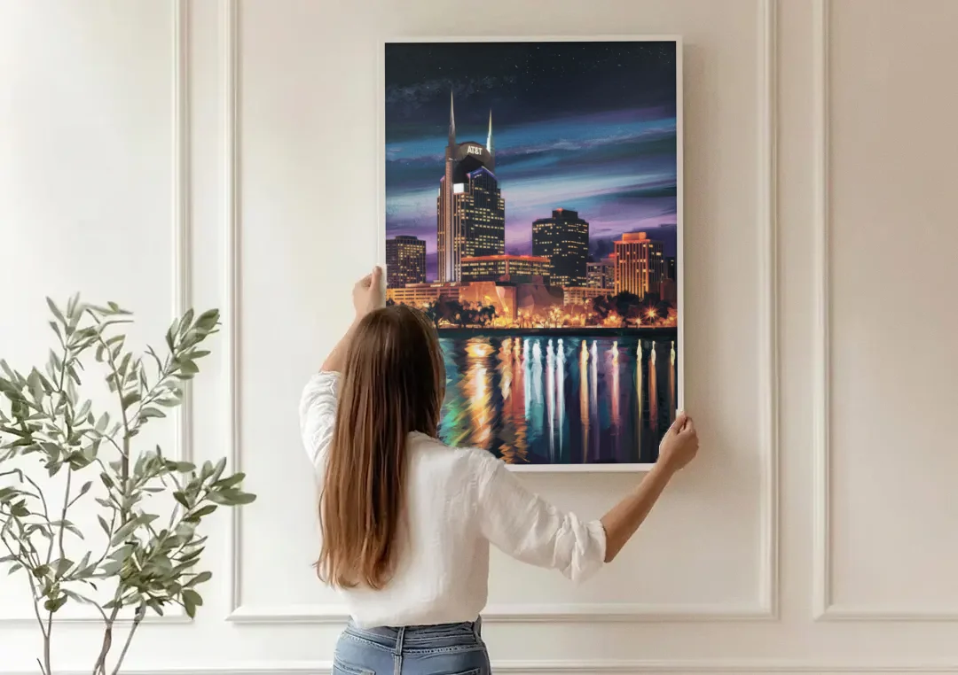 Nashville Cityscape at Night canvas wall art being hung on a paneled wall