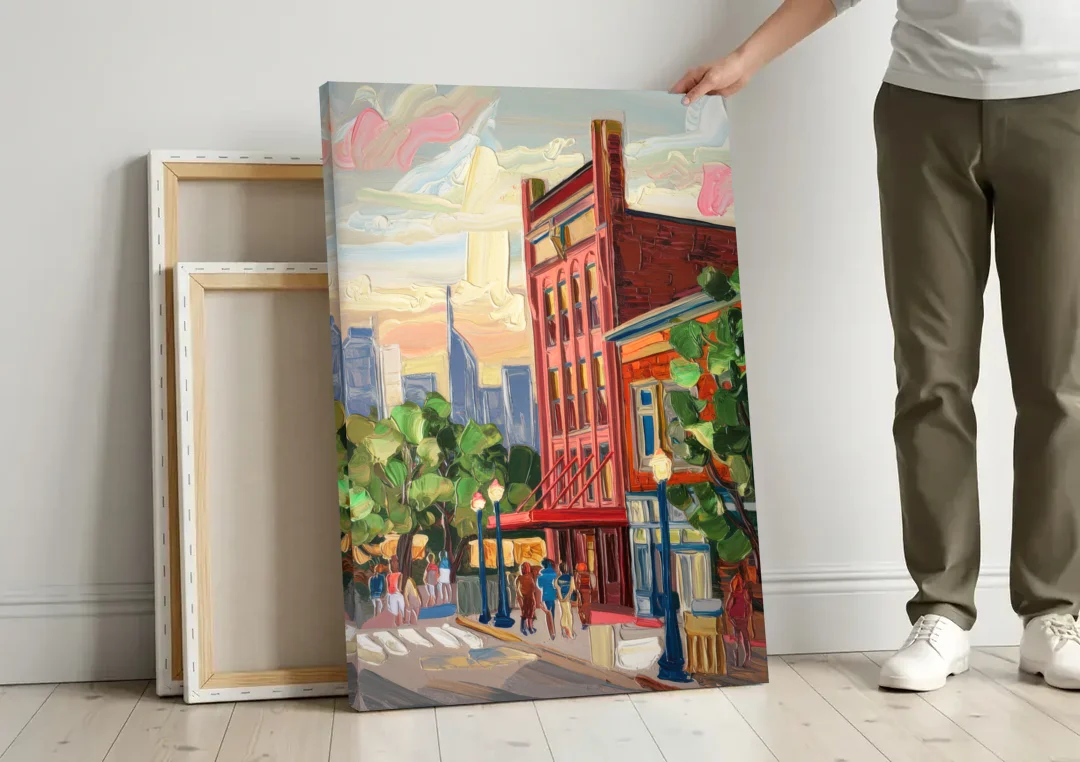 Nashville Grand Ole Opry canvas wall art leaning against a wall next to blank canvases