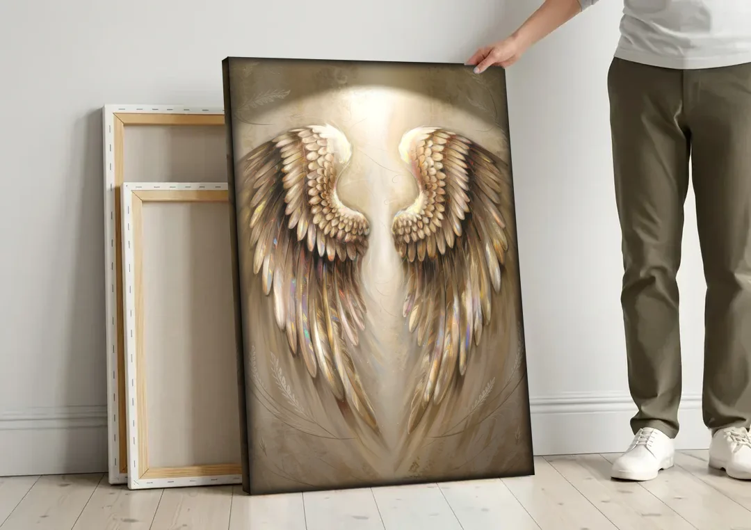 Nashville Wings Mural Tribute canvas wall art leaning against a wall next to blank canvases