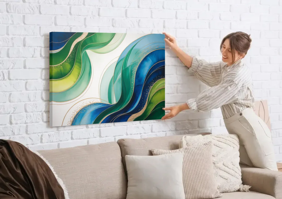 Natures Fluid Symphony Blue and Green Abstract canvas wall art being hung on a white brick wall above a sofa