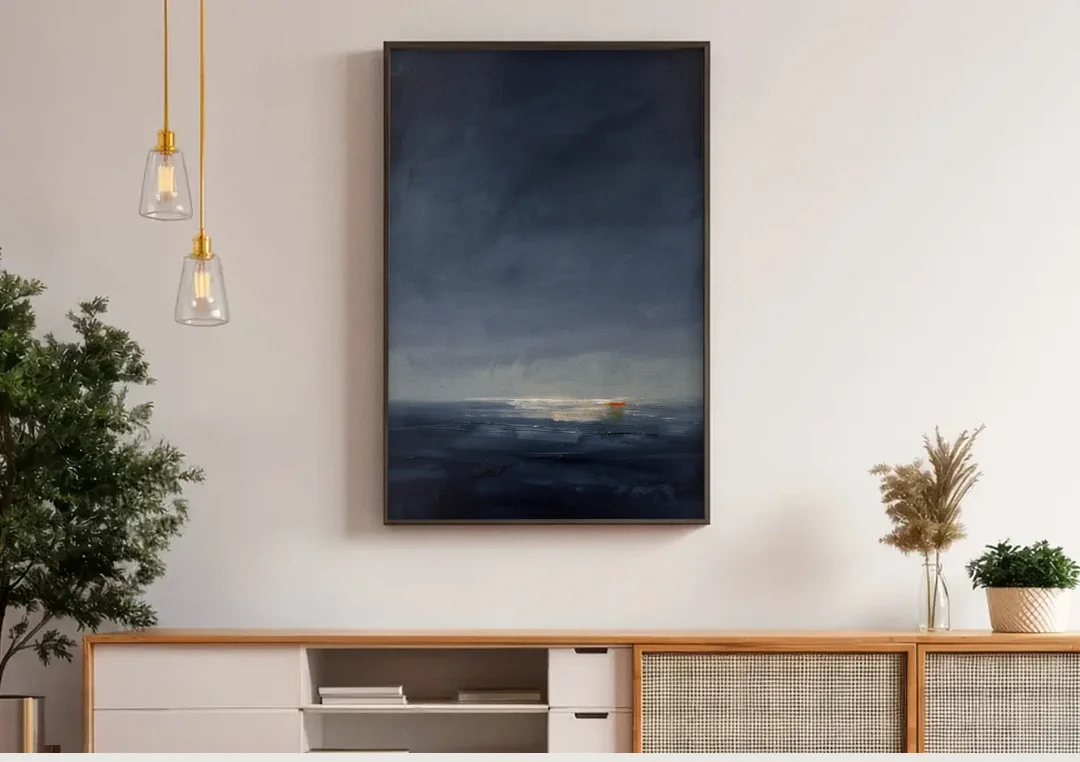 Navy Blue Abstract Wall Art with Last Light canvas wall art above a wooden sideboard under pendant lights