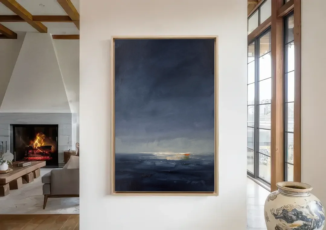 Navy Blue Abstract Wall Art with Last Light canvas wall art in a living room with a fireplace