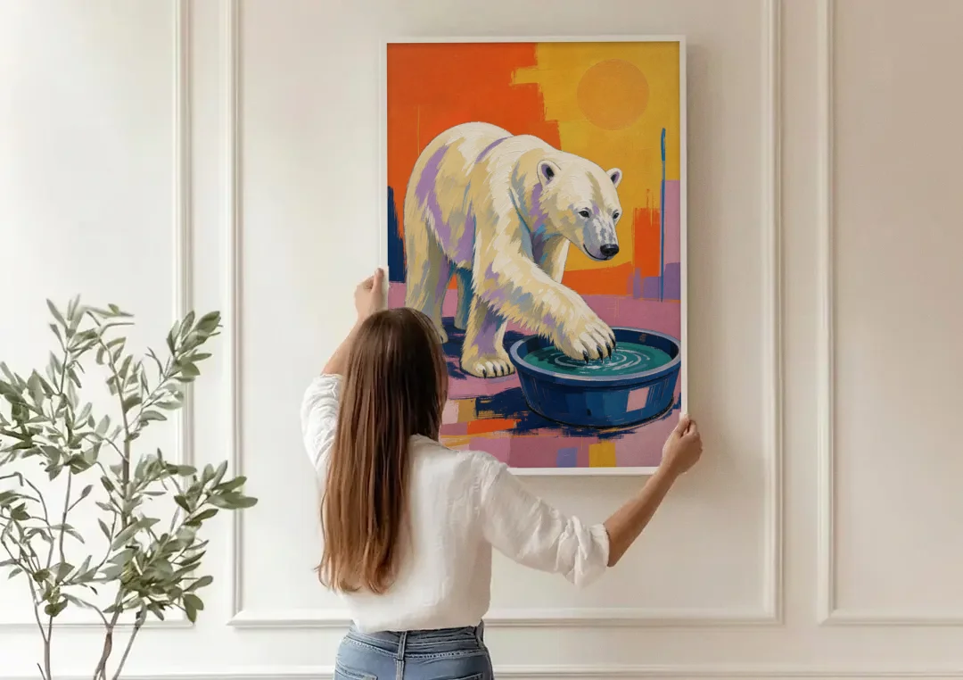 Navy Blue Bathroom Wall Art with Polar Bear Paw canvas wall art being hung on a paneled wall