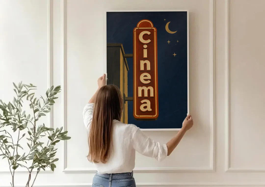 Navy Blue Wall Art Cinema Blade Sign at Night canvas wall art being hung on a paneled wall
