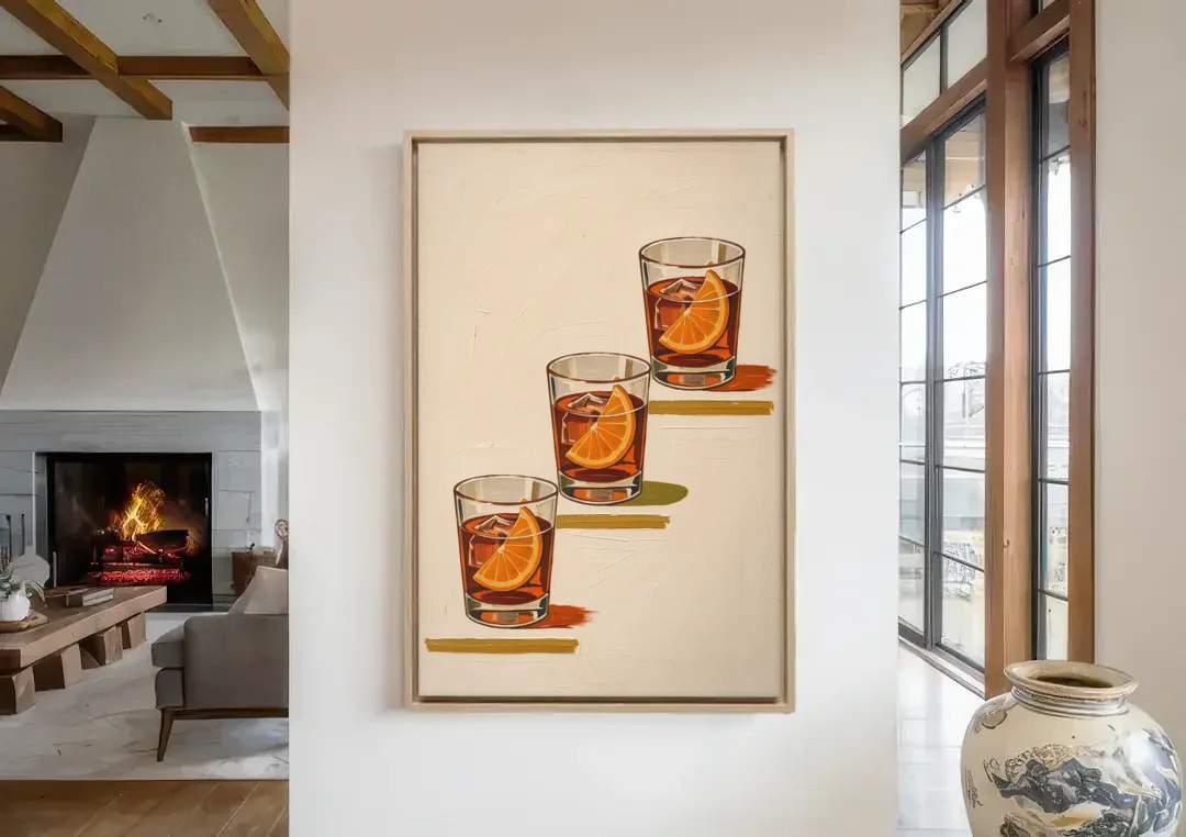 Negroni Wall Art with Three Orange Slices canvas wall art in a living room with a fireplace