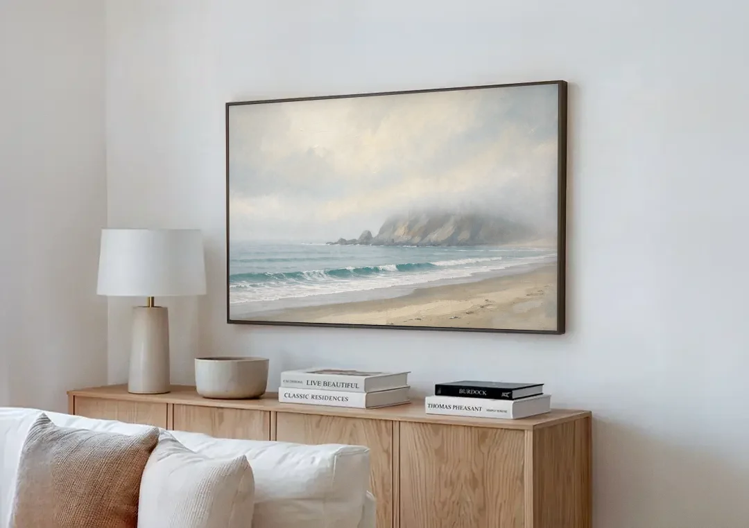 Neutral Bedroom Wall Art of a Foggy Headland canvas wall art above a wooden sideboard next to a sofa