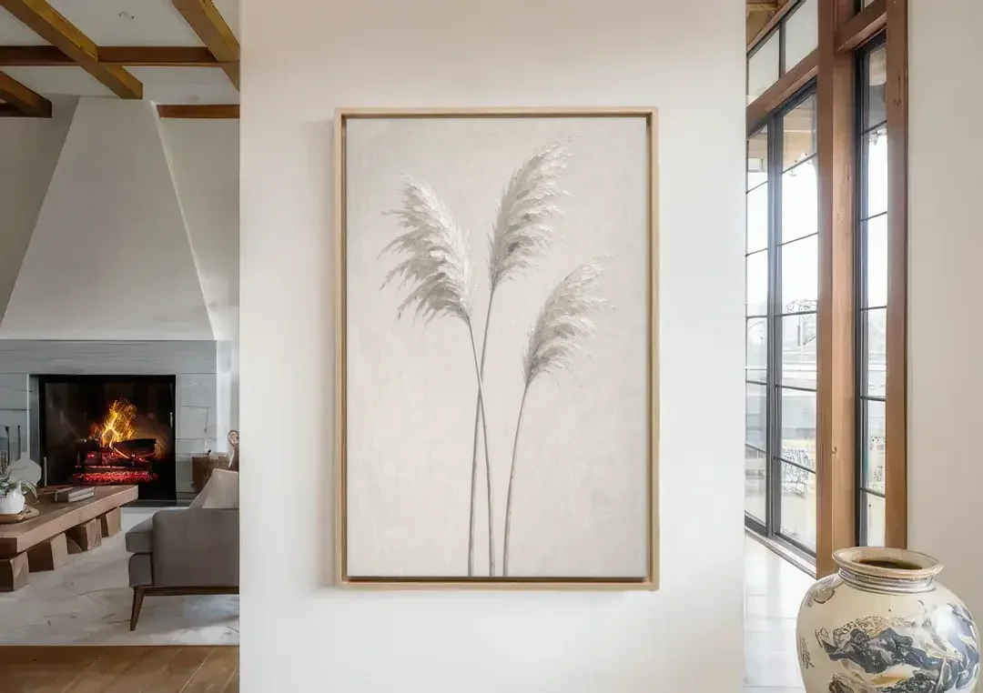 Neutral Botanical Prints of Pampas Grass Plumes canvas wall art in a living room with a fireplace