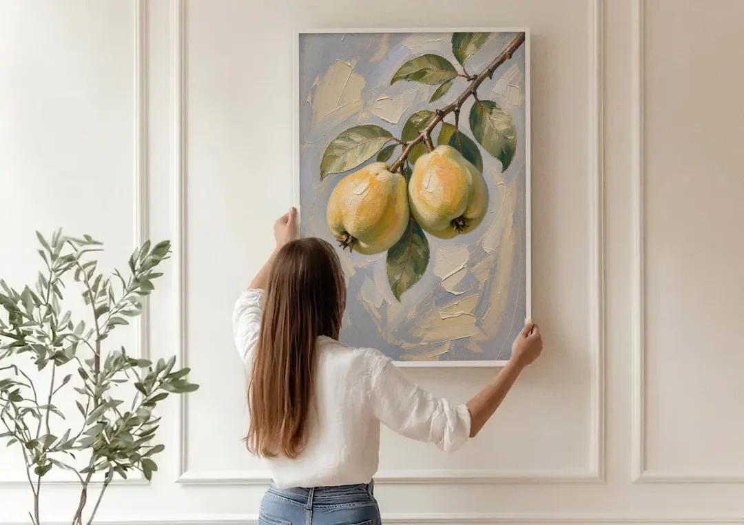 Neutral Botanical Wall Art of a Quince Branch canvas wall art being hung on a paneled wall