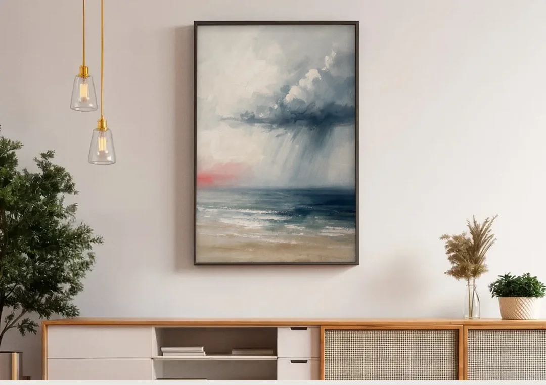 Neutral Distant Rain Squall Over a Calm Sea canvas wall art above a wooden sideboard under pendant lights