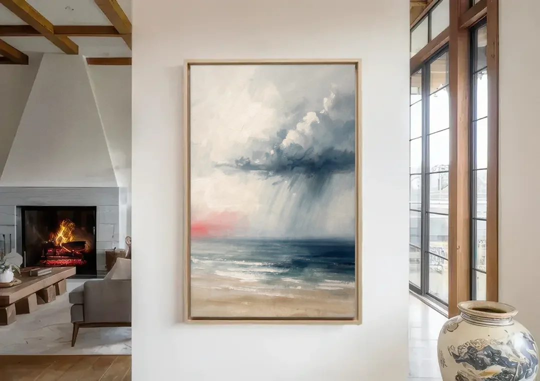 Neutral Distant Rain Squall Over a Calm Sea canvas wall art in a living room with a fireplace