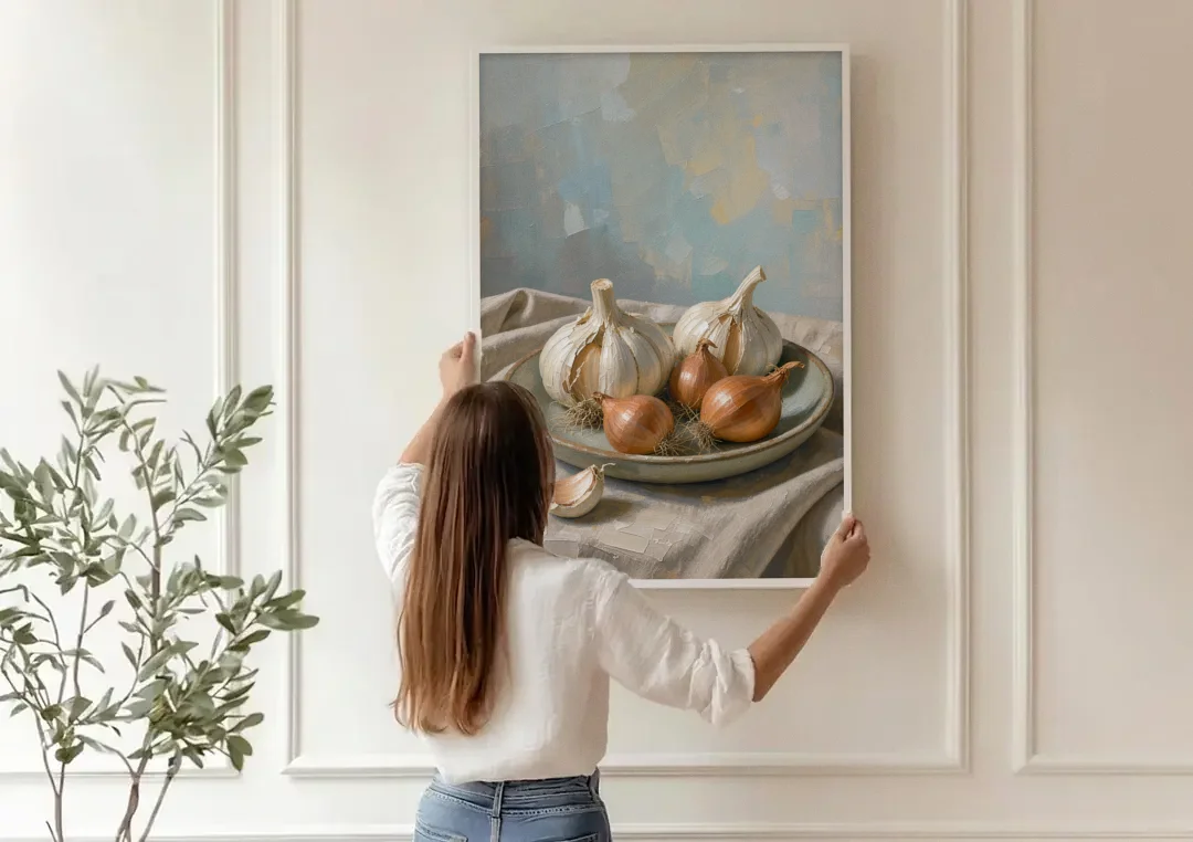 Neutral Garlic and Shallots on Linen for the Kitchen canvas wall art being hung on a paneled wall
