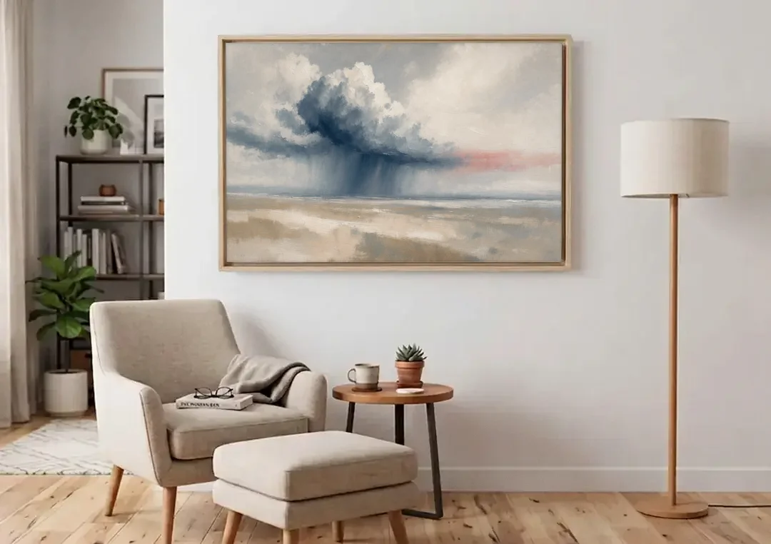 Neutral Landscape of Passing Rain Over the Plain canvas wall art above an armchair in a bright living room