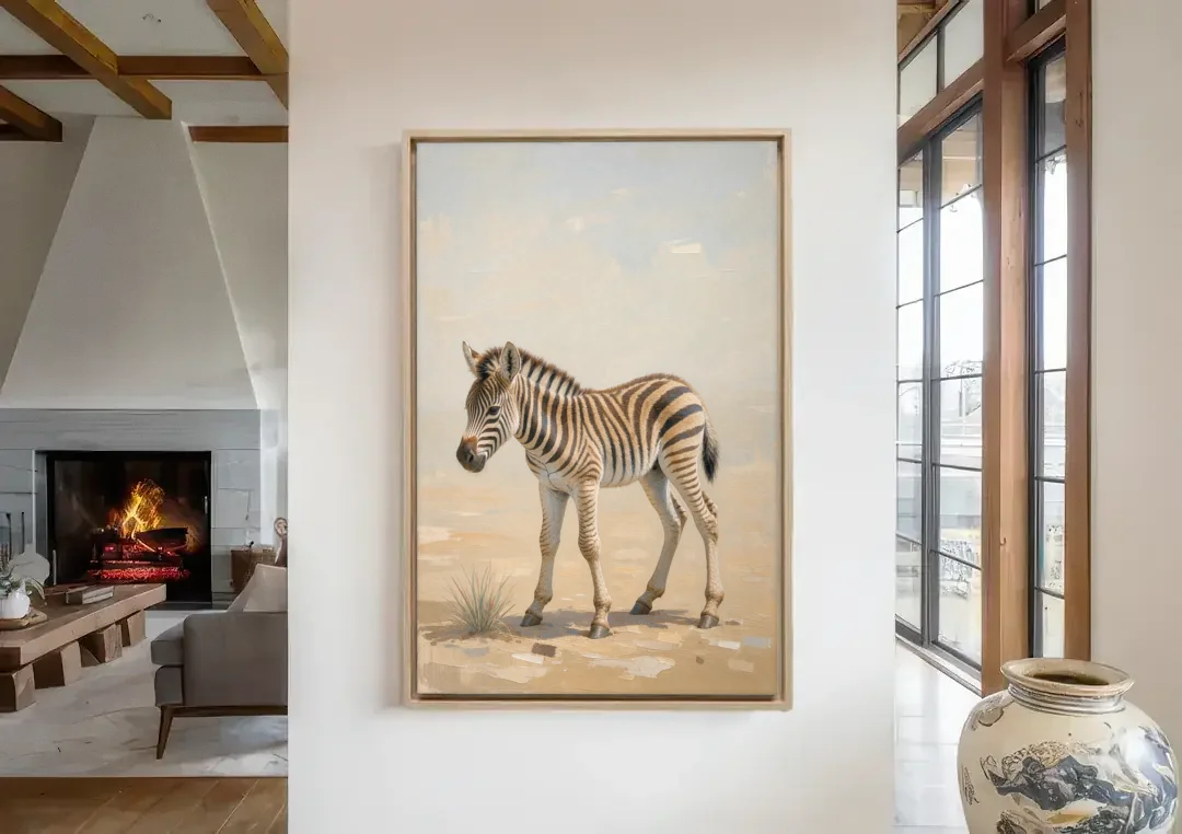 Neutral Safari Nursery Decor with a Wobbly Zebra Foal canvas wall art in a living room with a fireplace