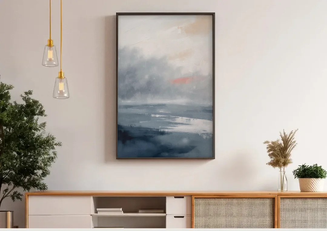 Neutral Sea Fog on Calm Water canvas wall art above a wooden sideboard under pendant lights