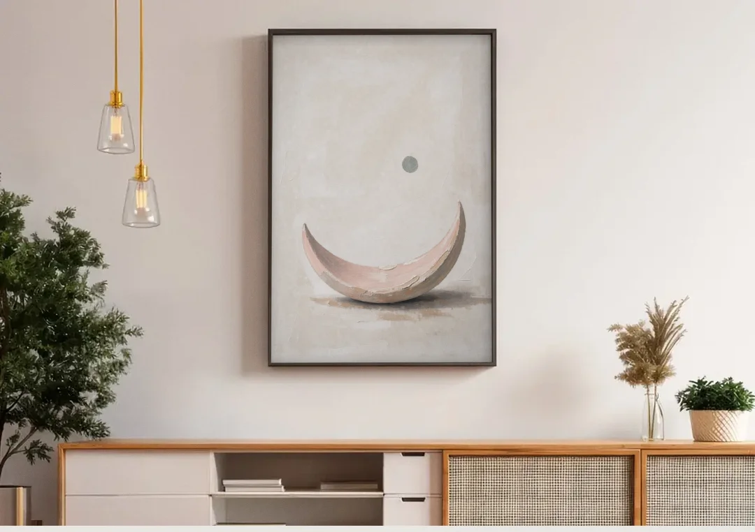 Neutral Wall Art for Bedroom with Blush Crescent Cradle canvas wall art above a wooden sideboard under pendant lights
