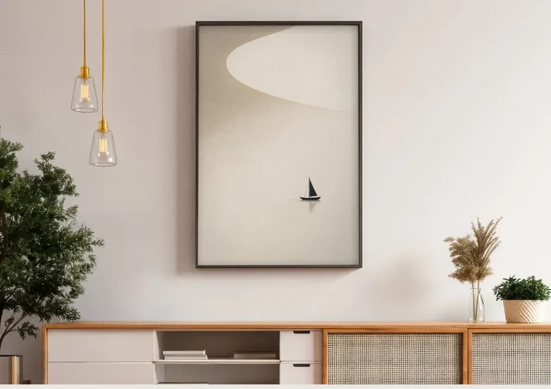 Neutral Wall Art of a Becalmed Sailboat canvas wall art above a wooden sideboard under pendant lights