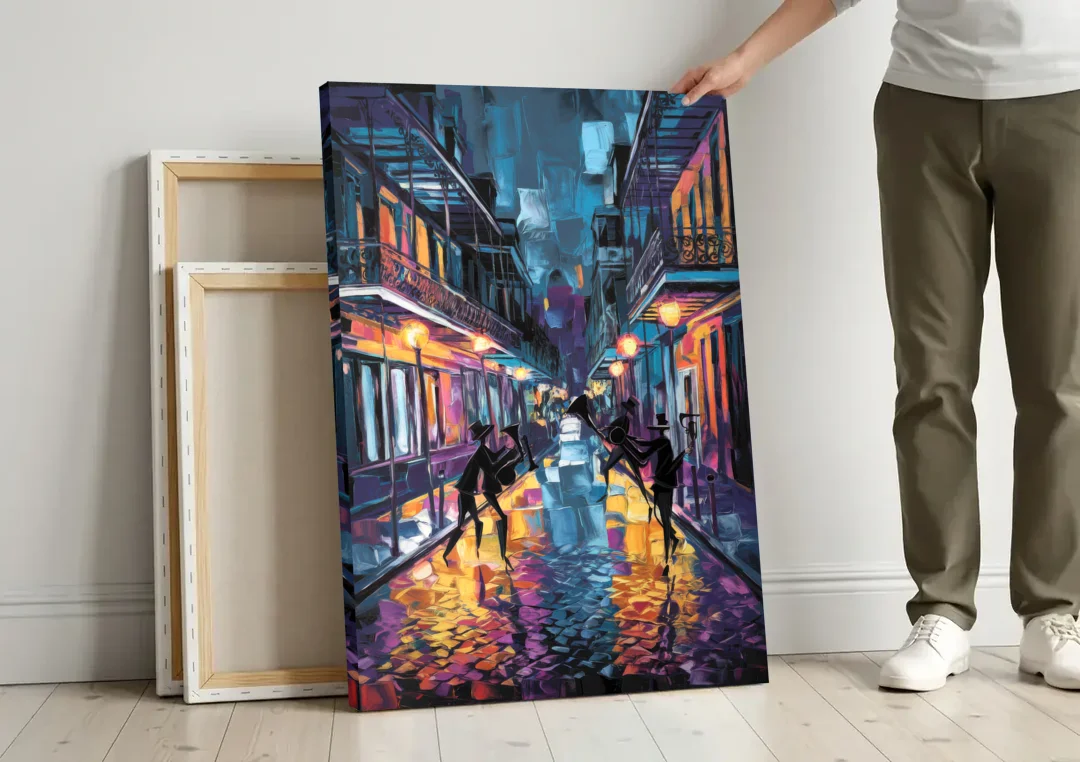 New Orleans Bourbon Street Vibes canvas wall art leaning against a wall next to blank canvases