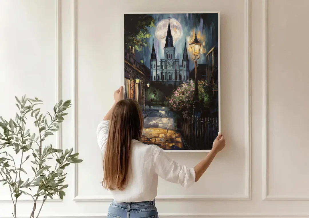 New Orleans Cathedral Silhouette canvas wall art being hung on a paneled wall