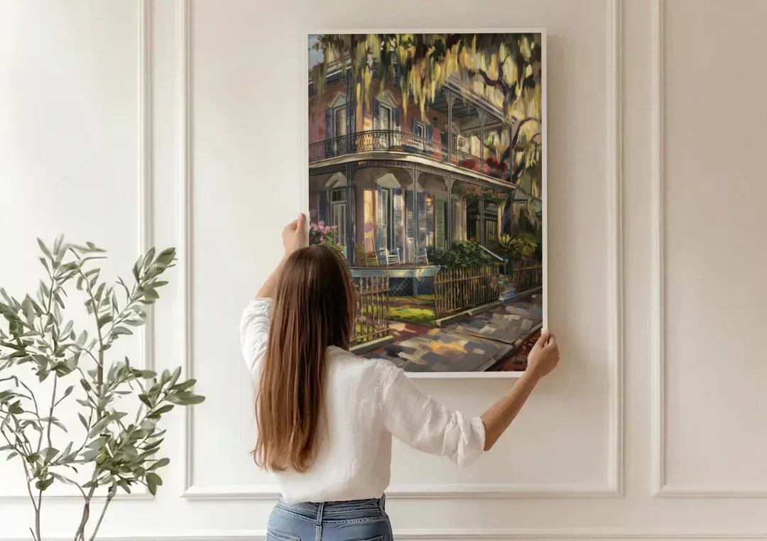 New Orleans Garden District Homes canvas wall art being hung on a paneled wall