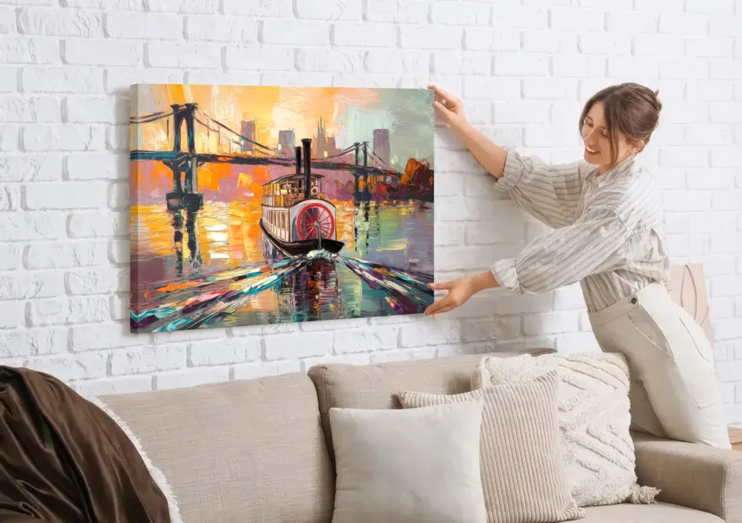 New Orleans Mississippi River Views canvas wall art being hung on a white brick wall above a sofa