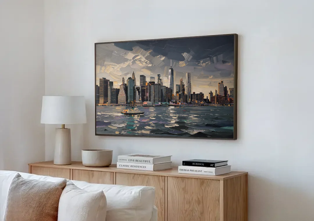 New York City Black And White Skyline canvas wall art above a wooden sideboard next to a sofa