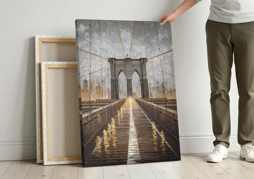 New York City Brooklyn Bridge View canvas wall art leaning against a wall next to blank canvases
