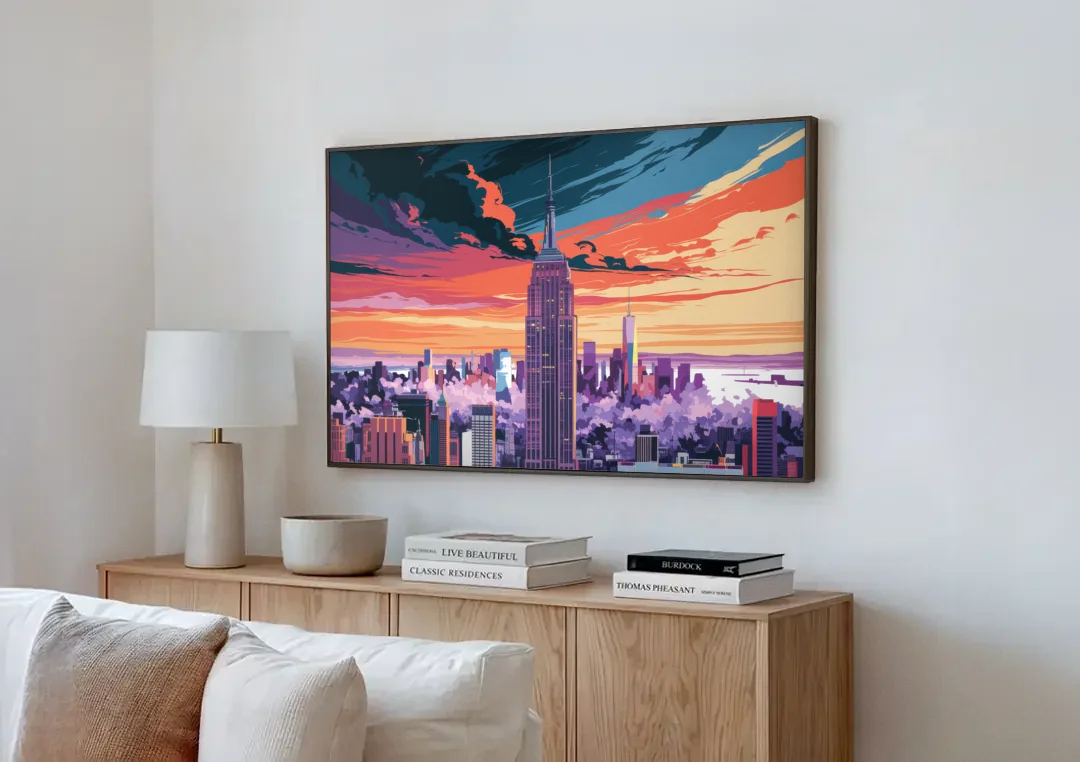 New York City Empire State Building canvas wall art above a wooden sideboard next to a sofa