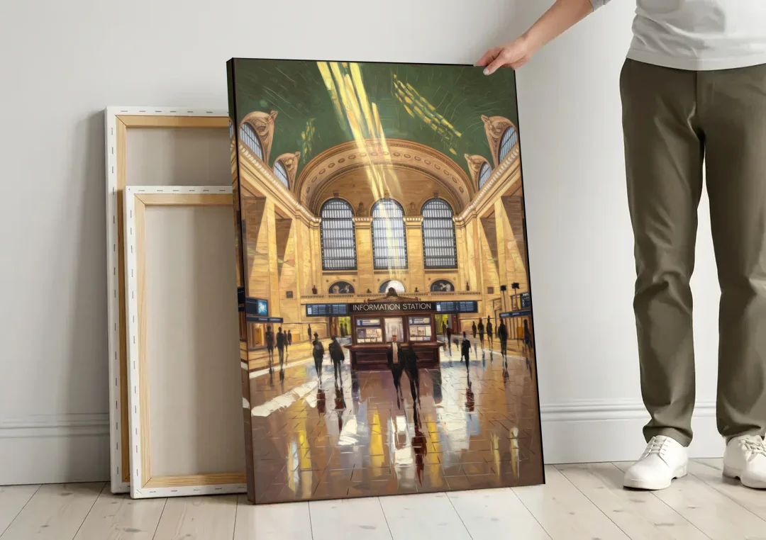 New York City Grand Central Station canvas wall art leaning against a wall next to blank canvases