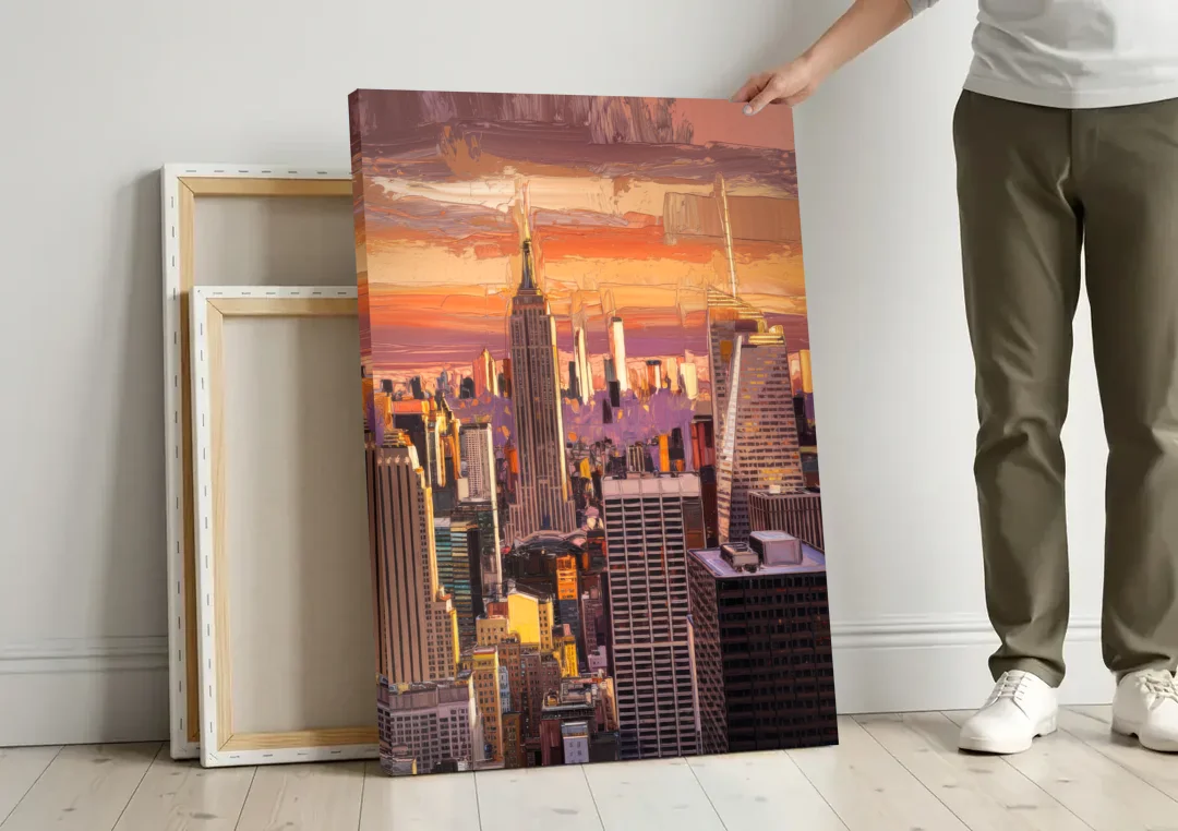 New York City Midtown Skyline canvas wall art leaning against a wall next to blank canvases