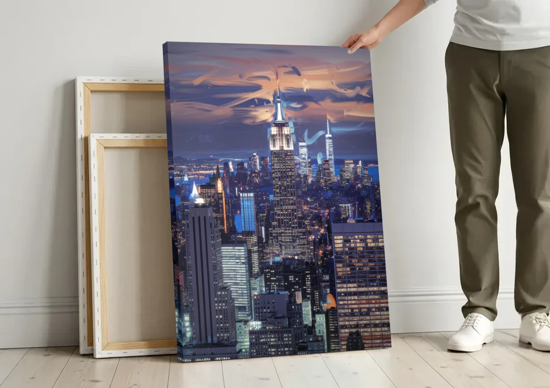 New York City Night Blue Lights Skyline canvas wall art leaning against a wall next to blank canvases