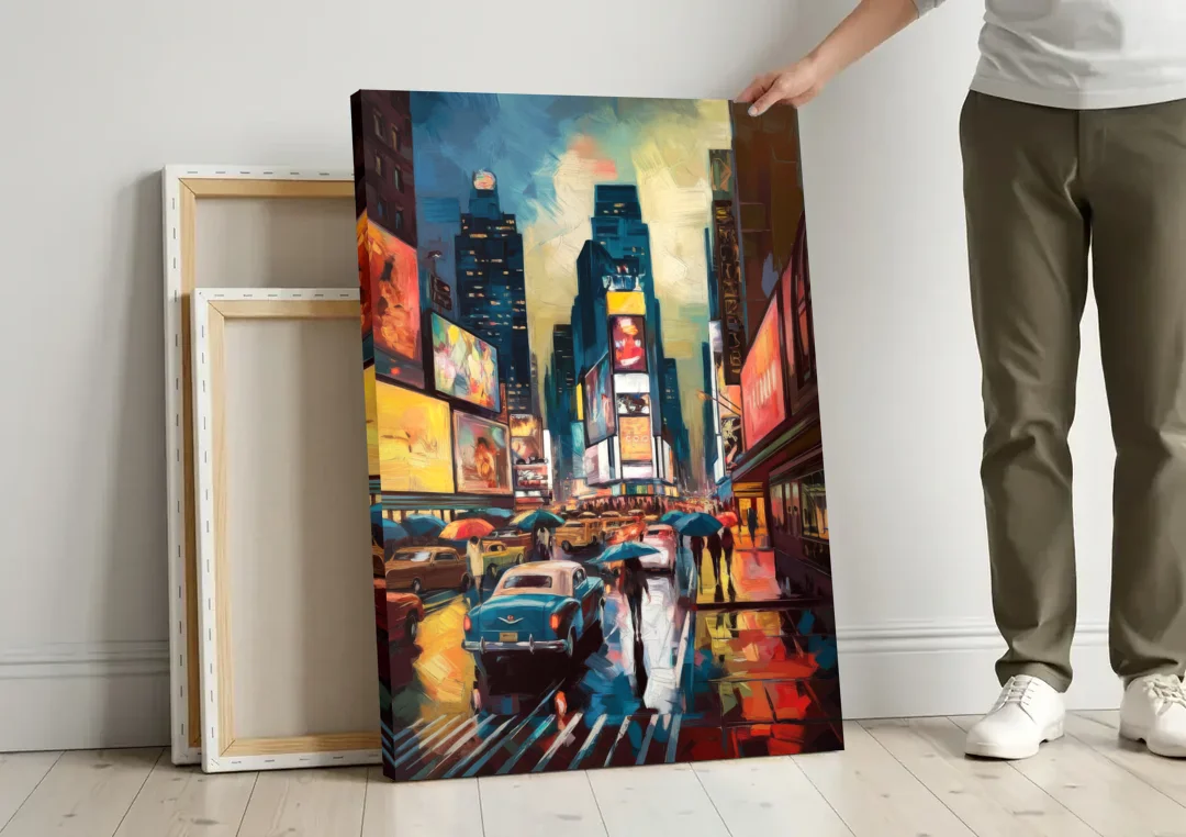 New York City Times Square at Midnight canvas wall art leaning against a wall next to blank canvases