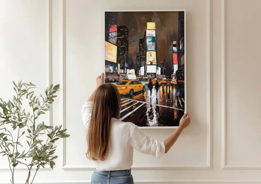New York City Times Square in Motion Night canvas wall art being hung on a paneled wall