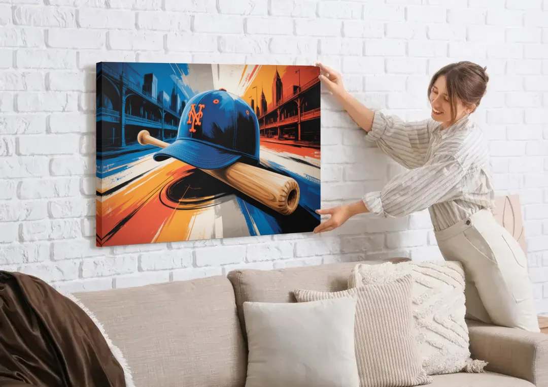 New York Mets Abstract Baseball Art Energetic Triumph in Blue and Orange canvas wall art being hung on a white brick wall above a sofa