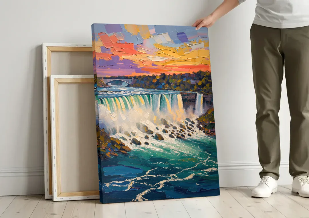 Niagara Falls Summer View canvas wall art leaning against a wall next to blank canvases
