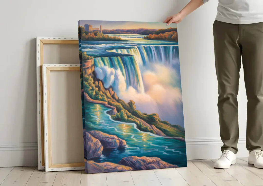 Niagara Falls Water Mist canvas wall art leaning against a wall next to blank canvases