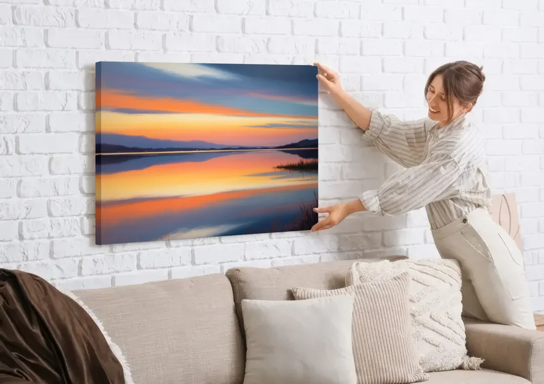 Nichupté Lagoon Sunset canvas wall art being hung on a white brick wall above a sofa