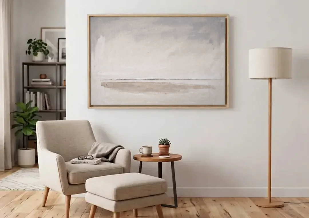 Nordic Wall Art Driftwood Band Under Sea Fog canvas wall art above an armchair in a bright living room