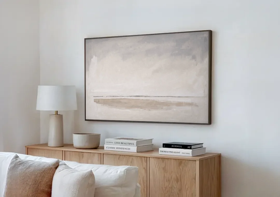 Nordic Wall Art Driftwood Band Under Sea Fog canvas wall art above a wooden sideboard next to a sofa