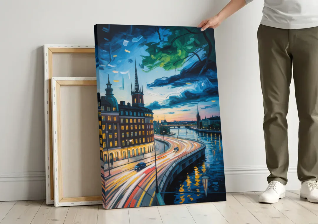 Norrmalm Nights canvas wall art leaning against a wall next to blank canvases