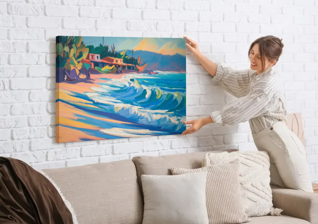 North Sayulita Shore canvas wall art being hung on a white brick wall above a sofa